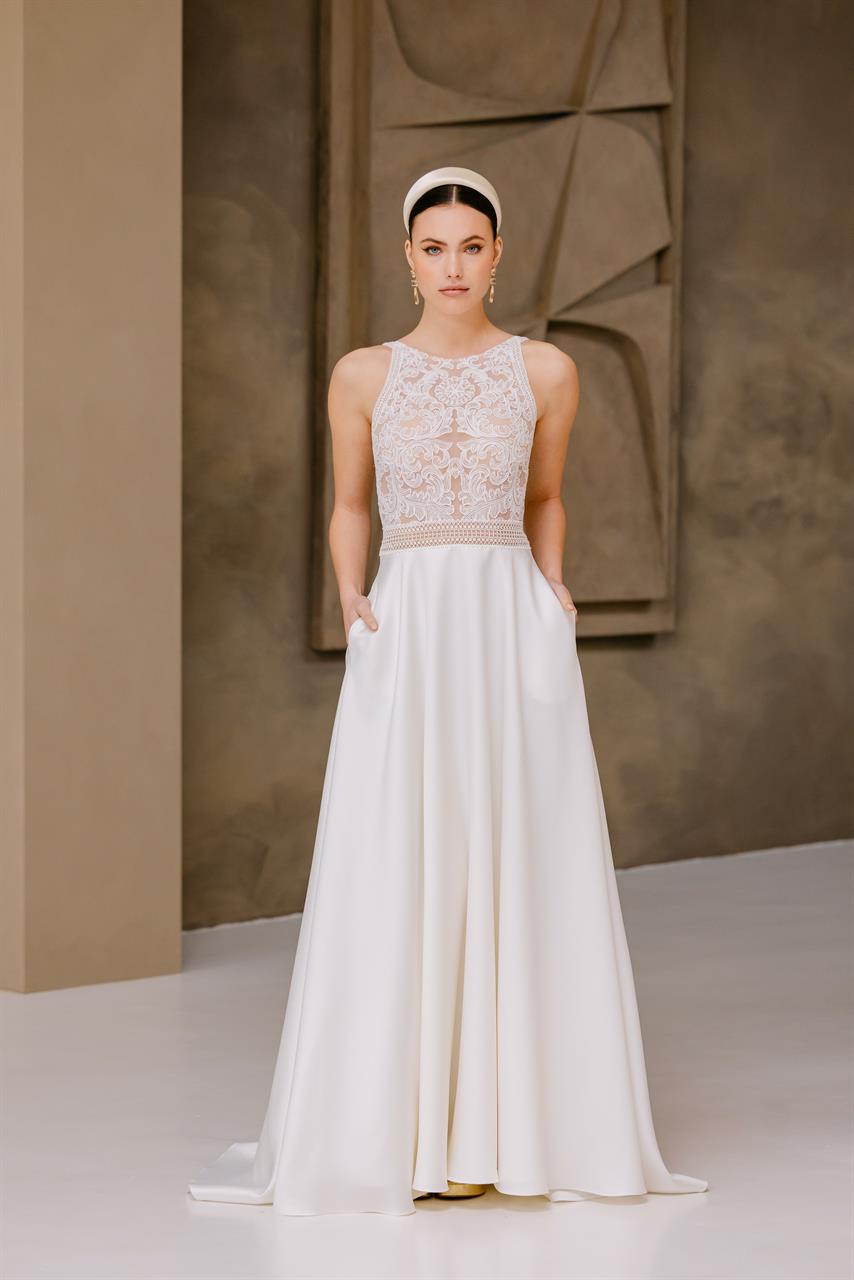 Modernes Boho-Brautkleid mit hochgeschlossenem Spitzenoberteil Modernes Boho-Brautkleid mit hochgeschlossenem Spitzenoberteil
