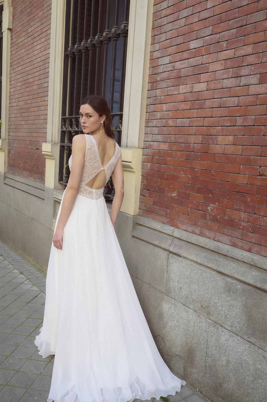 Modernes Boho-Brautkleid mit abnehmbaren Ärmeln Modernes Boho-Brautkleid mit abnehmbaren Ärmeln
